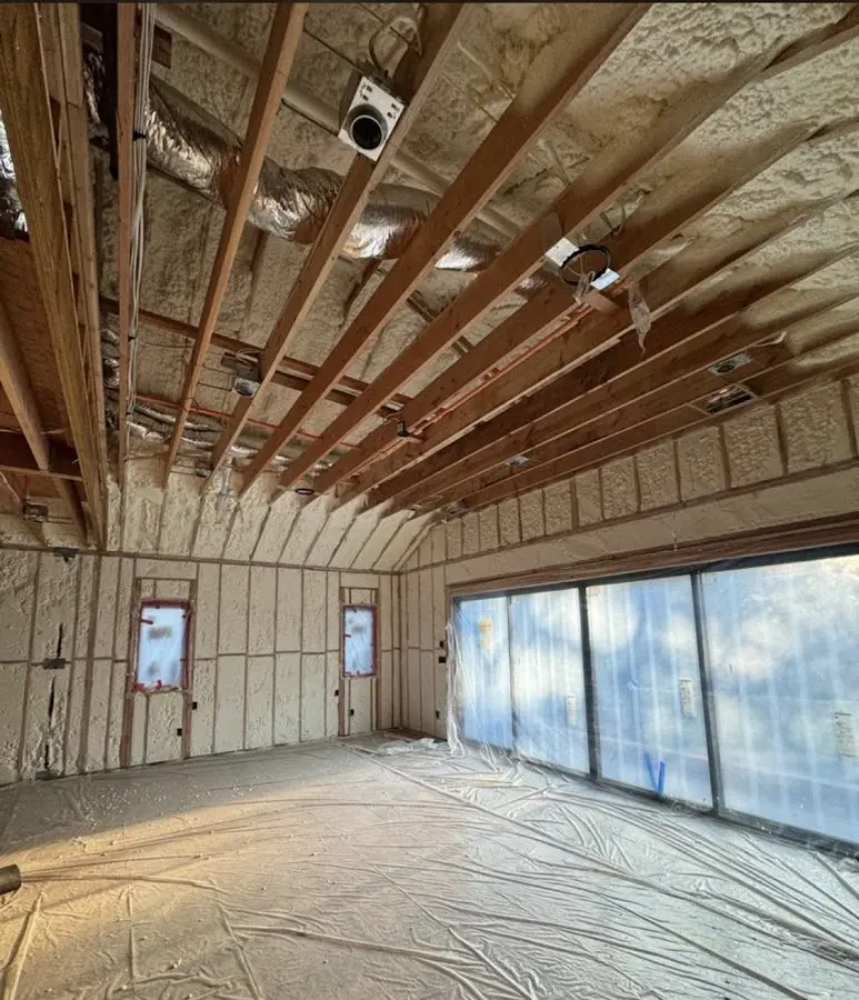 Interior walls and ceiling insulated with spray foam during new construction in Westmoreland